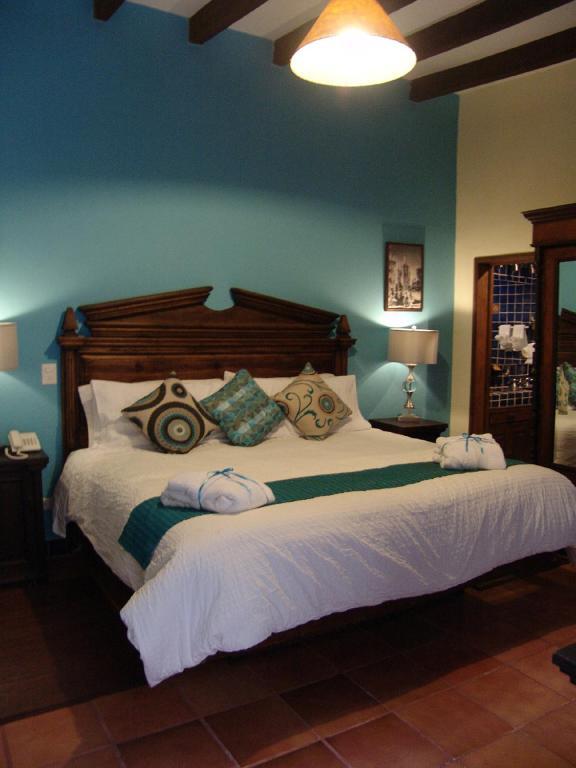 Casa Del Tio Hotel Boutique San Miguel de Allende Szoba fotó A bedroom at Hotel San Angel Inn